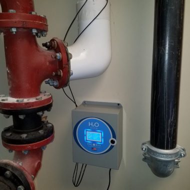 installed H2O ELite Labs EWC between red and black pipe